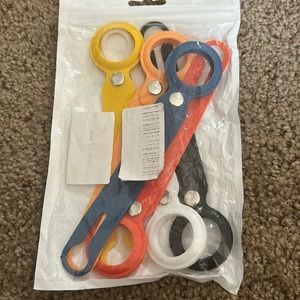 They are AirTag holders that come in multiple colors